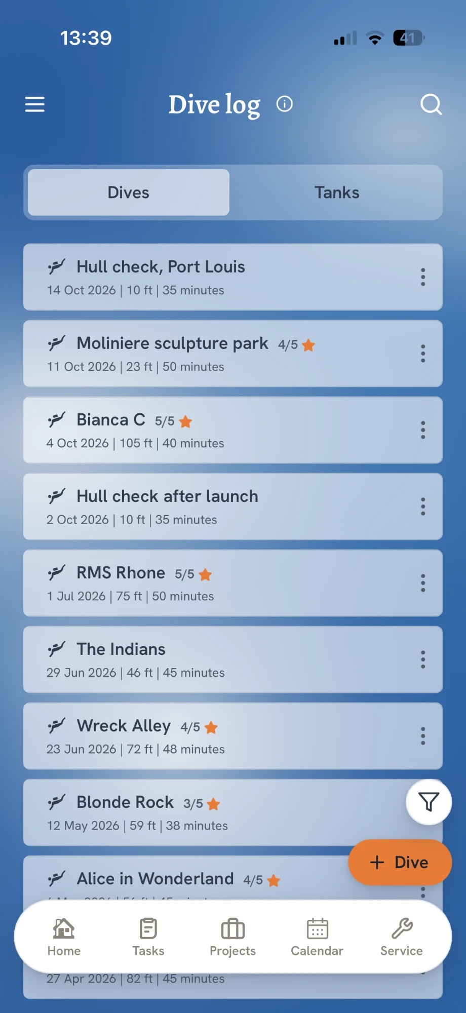The Dive log screen in the app: a list of dives with date, depth, duration and star ratings, Dives and Tanks tabs, and an add-dive button